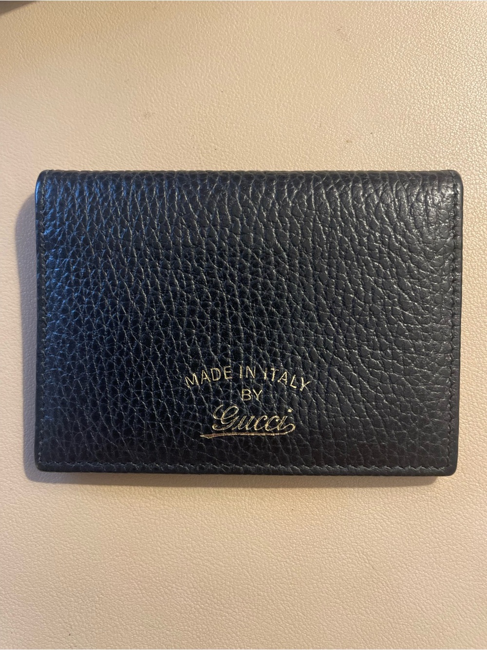 Gucci Black Pebbled Leather Card Holder with Gold Logo Script
